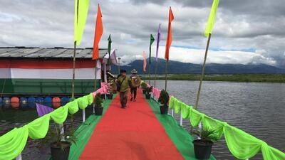 The first-ever floating photo exhibition was held at Loktak Lake (Sendra). (Twitter: B.Narayanan)