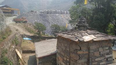 The Haat village in Chamoli where much, construction debris and demolition waste are allegedly dumped near the ancient Lakshmi-Narayan temple. (Sourced Photo) The Haat village in Chamoli where much, construction debris and demolition waste are allegedly dumped near the ancient Lakshmi-Narayan temple. (Sourced Photo)