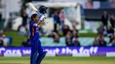 India's Harmanpreet Kaur celebrates getting her century during play during the second women's one day international cricket match (AP) India's Harmanpreet Kaur celebrates getting her century during play during the second women's one day international cricket match (AP)