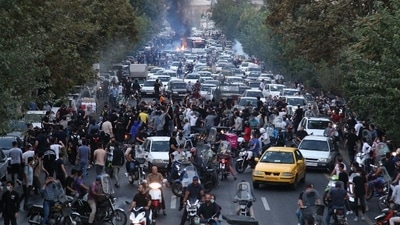 Iran Hijab Protests: Iranian demonstrators taking to the streets of the capital Tehran during a protest for Mahsa Amini. (AFP) Iran Hijab Protests: Iranian demonstrators taking to the streets of the capital Tehran during a protest for Mahsa Amini. (AFP)