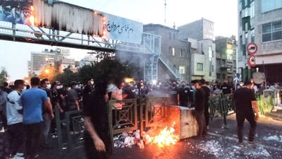 Iran Hijab Protests: Iranian demonstrators burning a rubbish bin in the capital Tehran. (AFP)