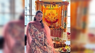 For the occasion, Karisma Kapoor wore a floral printed anarkali set teamed with a striped dupatta. (Instagram/@therealkarismakapoor)