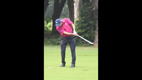 A club member in action during the Chandigarh Golf League underway at the Chandigarh Golf Club. (HT Photo)