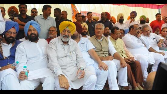 Punjab BJP leaders protesting against the chief minister Bhagwant Mann-led Aam Aadmi Party government, at the party head office in Sector 37, Chandigarh, before they were detained on Thursday. (Keshav Singh/HT)
