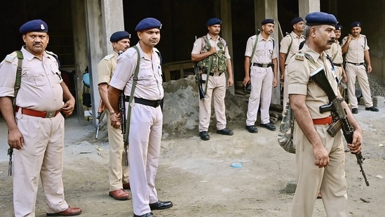 Police personnel during a raid of National Investigation Agency (NIA) at the residence of a Social Democratic Party of India (SDPI) leader, in Pathanamthitta, Kerala. (PTI)