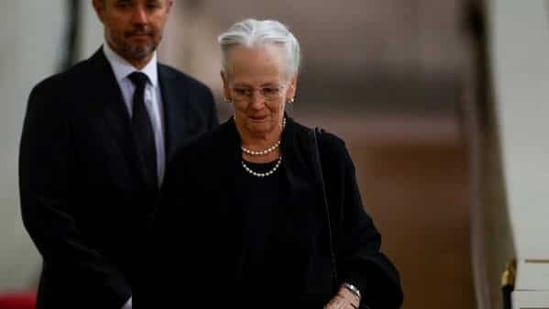 FILE - Denmark's Queen Margrethe pays her respect to the coffin of Britain's Queen Elizabeth, following her death, during her lying-in-state at Westminster Hall, in London on 18 September, 2022. (AP)