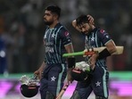 Babar Azam and Mohammad Rizwan leave the field after their win in the second T20 match against England(AP) Babar Azam and Mohammad Rizwan leave the field after their win in the second T20 match against England(AP)