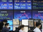 Asian stock markets followed Wall Street lower on Thursday after the Federal Reserve delivered another big interest rate hike to cool galloping inflation and raised its outlook for more. (AP Photo/Ahn Young-joon) Asian stock markets followed Wall Street lower on Thursday after the Federal Reserve delivered another big interest rate hike to cool galloping inflation and raised its outlook for more. (AP Photo/Ahn Young-joon)