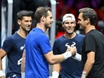 Andy Murray (L) shakes hands with Roger Federer next to Novak Djokovic (back L) and Rafael Nadal (back R) during a practice session Andy Murray (L) shakes hands with Roger Federer next to Novak Djokovic (back L) and Rafael Nadal (back R) during a practice session