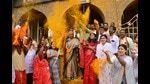 Finance Minister Nirmala Sitharaman (centre) seen throwing turmeric powder (bhandara) at Khandoba Temple in Jejuri on Friday. (VIJAYKUMAR HARISHCHANDRE/HT PHOTO) Finance Minister Nirmala Sitharaman (centre) seen throwing turmeric powder (bhandara) at Khandoba Temple in Jejuri on Friday. (VIJAYKUMAR HARISHCHANDRE/HT PHOTO)
