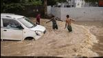 Due to the continued rain, several areas in Gurugram went under water due to which most private schools remained closed on Friday. Most office-goers opted to work from home on Friday after an advisory to that effect was issued by the district administration late Thursday. (REUTERS) Due to the continued rain, several areas in Gurugram went under water due to which most private schools remained closed on Friday. Most office-goers opted to work from home on Friday after an advisory to that effect was issued by the district administration late Thursday. (REUTERS)