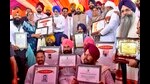 Ludhiana, India – September 23, 2022 : Chief Minister Bhagwant Mann, Cabinet Minister Kuldeep Singh Dhaliwal, Vice Chancellor Dr. Satbir Singh Gosal honoring progressive farmers after inauguration of Kisan Mela at PAU and later Pashu Palan Mela at GADVASU in Ludhiana on Friday, September 23, 2022. (Photo by Gurpreet Singh/Hindustan Times) Ludhiana, India – September 23, 2022 : Chief Minister Bhagwant Mann, Cabinet Minister Kuldeep Singh Dhaliwal, Vice Chancellor Dr. Satbir Singh Gosal honoring progressive farmers after inauguration of Kisan Mela at PAU and later Pashu Palan Mela at GADVASU in Ludhiana on Friday, September 23, 2022. (Photo by Gurpreet Singh/Hindustan Times)