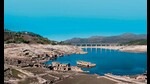The abandoned village of Aceredo emerges, ghost-like, at the bottom of the Alto Lindoso reservoir in Spain. In the distance, a bridge spans waters that are now down to 15% of reservoir capacity. (Shutterstock) The abandoned village of Aceredo emerges, ghost-like, at the bottom of the Alto Lindoso reservoir in Spain. In the distance, a bridge spans waters that are now down to 15% of reservoir capacity. (Shutterstock)