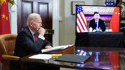 US President Joe Biden with his Chinese counterpart Xi Jinping during a virtual meet in November 2021. (AFP Photo) US President Joe Biden with his Chinese counterpart Xi Jinping during a virtual meet in November 2021. (AFP Photo)