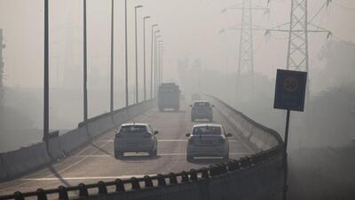 Commuters drive amidst heavy smog along a road in New Delhi. (AFP) Commuters drive amidst heavy smog along a road in New Delhi. (AFP)