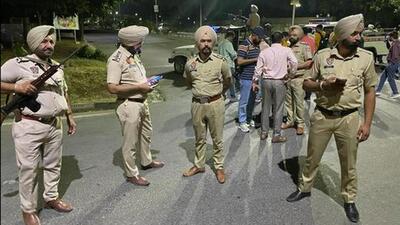 Punjab Police personnel cordon off their intelligence headquarters in Sector 77, Mohali, after the rocket-propelled grenade attack on May 9, 2022. Canada-based gangster Lakhbir Singh, alias Landa, played a key role in planning the terror attack. (Keshav Singh/HT file) Punjab Police personnel cordon off their intelligence headquarters in Sector 77, Mohali, after the rocket-propelled grenade attack on May 9, 2022. Canada-based gangster Lakhbir Singh, alias Landa, played a key role in planning the terror attack. (Keshav Singh/HT file)