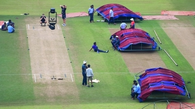 Groundsmen dry the playing field after rains at Vidarbha Cricket Association Stadium, ahead of the second T20 cricket match between India and Australia, in Nagpur (PTI) Groundsmen dry the playing field after rains at Vidarbha Cricket Association Stadium, ahead of the second T20 cricket match between India and Australia, in Nagpur (PTI)