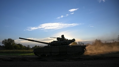 Ukrainian soldiers ride a tank in eastern Ukraine, on September 22, 2022, amid the Russian invasion of Ukraine. (AFP) Ukrainian soldiers ride a tank in eastern Ukraine, on September 22, 2022, amid the Russian invasion of Ukraine. (AFP)