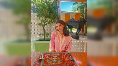 With her legs folded and smiling looking away from the camera, Khushi Kapoor struck an elegant pose on a charpai. (Instagram/@khushi05k)