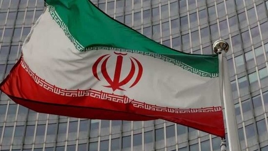 Iran Nuclear Deal: An Iranian flag flutters in front of the International Atomic Energy Agency (IAEA) headquarters in Vienna, Austria.(Reuters)
