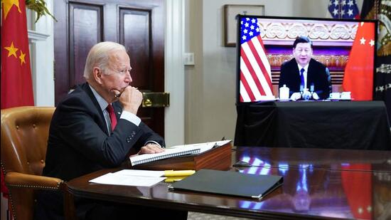 US President Joe Biden with his Chinese counterpart Xi Jinping during a virtual meet in November 2021. (AFP Photo)