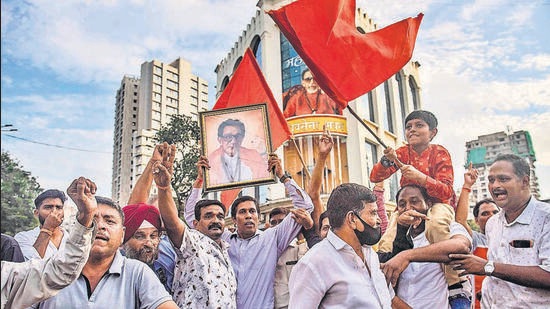 Mumbai, India - September 23, 2022: Shiv Sena workers celebrate after the Bombay High Court quashed the BMC's order and allowed Uddhav Thackeray-led Shiv Sena to hold Dussehra Melawa at Shivaji Park on October 5, outside Sena Bhavan, Dadar, in Mumbai, India, on Friday, September 23, 2022. (Photo by Satish Bate/Hindustan Times) (Satish Bate/HT PHOTO)