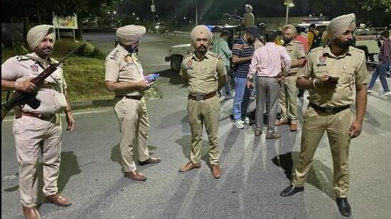Punjab Police personnel cordon off their intelligence headquarters in Sector 77, Mohali, after the rocket-propelled grenade attack on May 9, 2022. Canada-based gangster Lakhbir Singh, alias Landa, played a key role in planning the terror attack. (Keshav Singh/HT file)