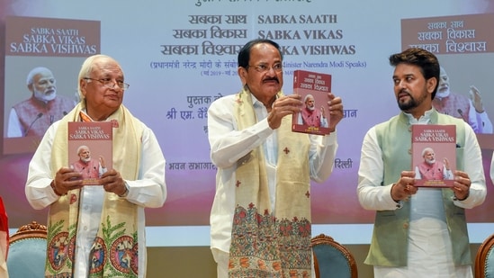 Former vice-president M Venkaiah Naidu along with Union minister Anurag Thakur and Kerala governor Arif Mohammad Khan releases the book 'Sabka Saath Sabka Vikas Sabka Vishwas in New Delhi on Friday.(PTI)