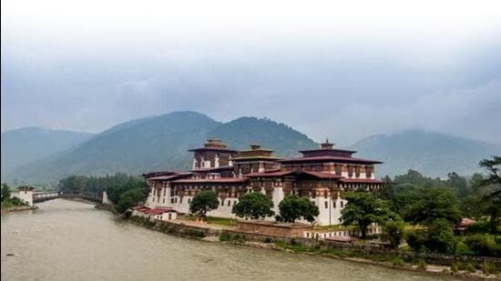 beautiful Punakha Dzong Monastery and the Mo Chhu river in paro Bhutan (Getty Images)