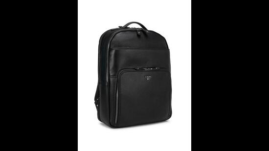 Textured leather bags with multipurpose pockets look both trendy and are extremely functional. (The smart black wax leather backpack by Da Milano, Italia)