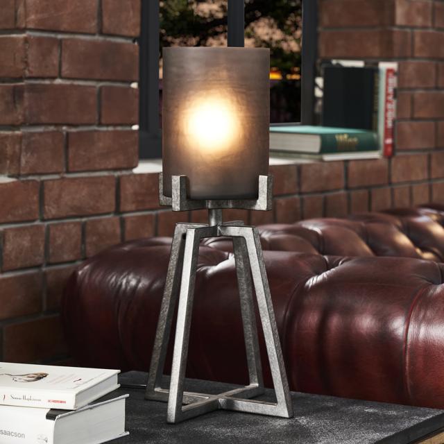 With a bold structural shape, this tall, mild steel table lamp has a hammered glass shade which aesthetically diffuses light. (The striking Argus Table Uplighter by Renovation Factory) With a bold structural shape, this tall, mild steel table lamp has a hammered glass shade which aesthetically diffuses light. (The striking Argus Table Uplighter by Renovation Factory)