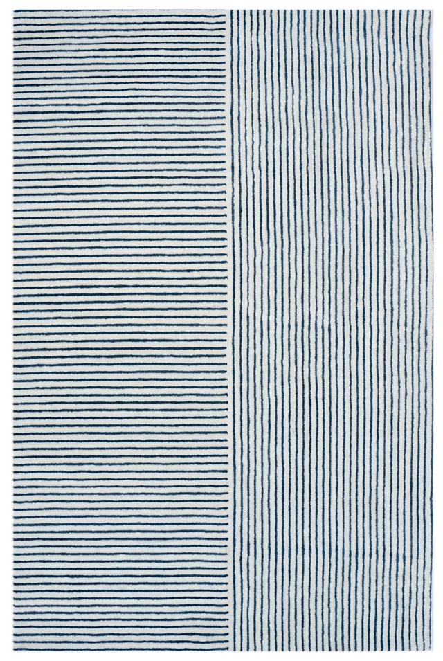 This stunning multi patterned striped rug will lend a masculine, nautical look to any room. (The Eucalyptus hand tufted wool rug by Rugberry) This stunning multi patterned striped rug will lend a masculine, nautical look to any room. (The Eucalyptus hand tufted wool rug by Rugberry)