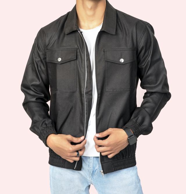 This zipper jacket has an elasticated hem, sleeve openings and trendy metallic snap buttons on the front patch pocket to give it a sharp fitted look. (Statement jacket in black by Styleyn) This zipper jacket has an elasticated hem, sleeve openings and trendy metallic snap buttons on the front patch pocket to give it a sharp fitted look. (Statement jacket in black by Styleyn)