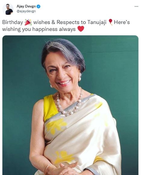 Ajay posted a photo of Tanuja smiling while posing for a photo.