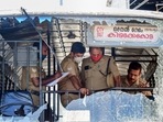 Thiruvananthapuram: Police personnel take stock of the damages done to a KSRTC bus after some miscreants threw stones during a PFI shutdown (PTI) Thiruvananthapuram: Police personnel take stock of the damages done to a KSRTC bus after some miscreants threw stones during a PFI shutdown (PTI)