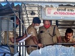 Thiruvananthapuram: Police personnel take stock of the damages done to a Kerala State Road Transport Corporation bus after some miscreants threw stones on it, during the 'hartal' called by PFI.(PTI) Thiruvananthapuram: Police personnel take stock of the damages done to a Kerala State Road Transport Corporation bus after some miscreants threw stones on it, during the 'hartal' called by PFI.(PTI)