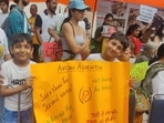 Children hold posters against animal cruelty at the Jantar Mantar in Delhi on Saturday.(HT Photo) Children hold posters against animal cruelty at the Jantar Mantar in Delhi on Saturday.(HT Photo)