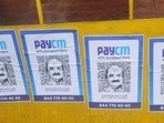 ‘PayCM’ photos with Karnataka chief minister Basavaraj Bommai's likeness were seen in Bengaluru on Wednesday (Credit: Twitter/@DebasisSahoo31) ‘PayCM’ photos with Karnataka chief minister Basavaraj Bommai's likeness were seen in Bengaluru on Wednesday (Credit: Twitter/@DebasisSahoo31)