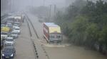 Gurugram, India-September 24: Vehicles wade through a waterlogged stretch in heavy rain on the NH-48 service road near Narsinghpur village, in Gurugram, India, on Saturday, September 24, 2022. (Photo by Parveen Kumar/Hindustan Times) Gurugram, India-September 24: Vehicles wade through a waterlogged stretch in heavy rain on the NH-48 service road near Narsinghpur village, in Gurugram, India, on Saturday, September 24, 2022. (Photo by Parveen Kumar/Hindustan Times)