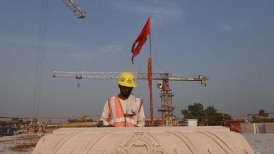 A construction worker at the Ram temple project site in Ayodhya. (FILE PHOTO) A construction worker at the Ram temple project site in Ayodhya. (FILE PHOTO)