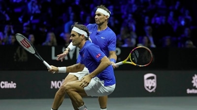 Federer played a doubles match on the first day, teaming up with his great rival and friend Rafael Nadal (AP) Federer played a doubles match on the first day, teaming up with his great rival and friend Rafael Nadal (AP)