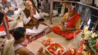 Union Home Minister Amit Shah on Saturday offered prayers at the famous Budhi Kali Mata temple in Bihar, which has for long been considered a symbol of Hindu-Muslim unity. (PTI) Union Home Minister Amit Shah on Saturday offered prayers at the famous Budhi Kali Mata temple in Bihar, which has for long been considered a symbol of Hindu-Muslim unity. (PTI)