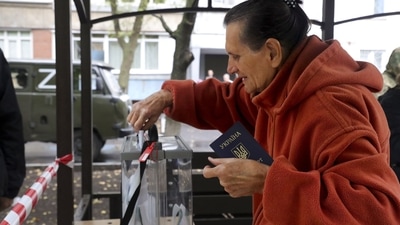 Russia-Ukraine War: A woman votes during a referendum in a mobile polling station in Mariupol, Donetsk. (AP) Russia-Ukraine War: A woman votes during a referendum in a mobile polling station in Mariupol, Donetsk. (AP)