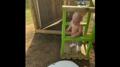 The image, taken from the Twitter video, shows the kid inside the elevator of his playhouse designed by his dad. (Imgur/@Tourmalin)