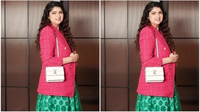 Anshula styled her quirky and fashionable outfit with minimal jewellery and accessories. She chose beige pointed stilettos with mesh attachment, statement gold rings, floral-shaped gold earrings adorned with a pearl, and a pearl strap mini shoulder bag. (Instagram)