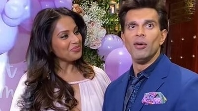 Bipasha Basu with husband Karan Singh Grover at their baby shower.