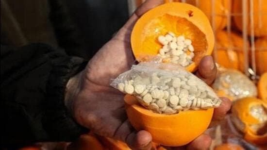 The operation teams intercepted a vehicle and seized a consignment of 5,05,000 tablets of meth pills, weighing 55.80 kg, from the possession of the woman peddler. (Representative Image/AFP) The operation teams intercepted a vehicle and seized a consignment of 5,05,000 tablets of meth pills, weighing 55.80 kg, from the possession of the woman peddler. (Representative Image/AFP)