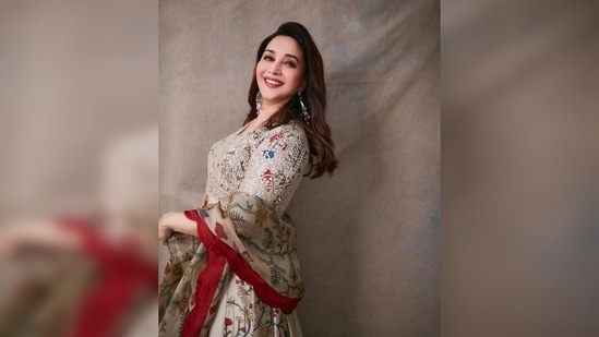 Madhuri Dixit's anarkali set is worth <span class='webrupee'>₹</span>1,34,999, as per the official website of the label.(Instagram/@madhuridixitnene)
