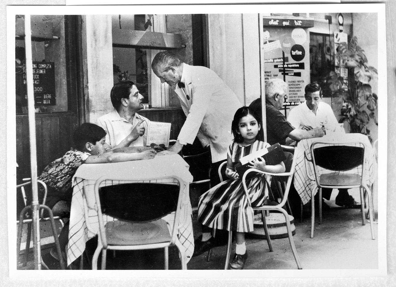 With her father, Indian space-research pioneer Vikram Sarabhai, and her brother Kartikeya, at a café in Venice in 1958.