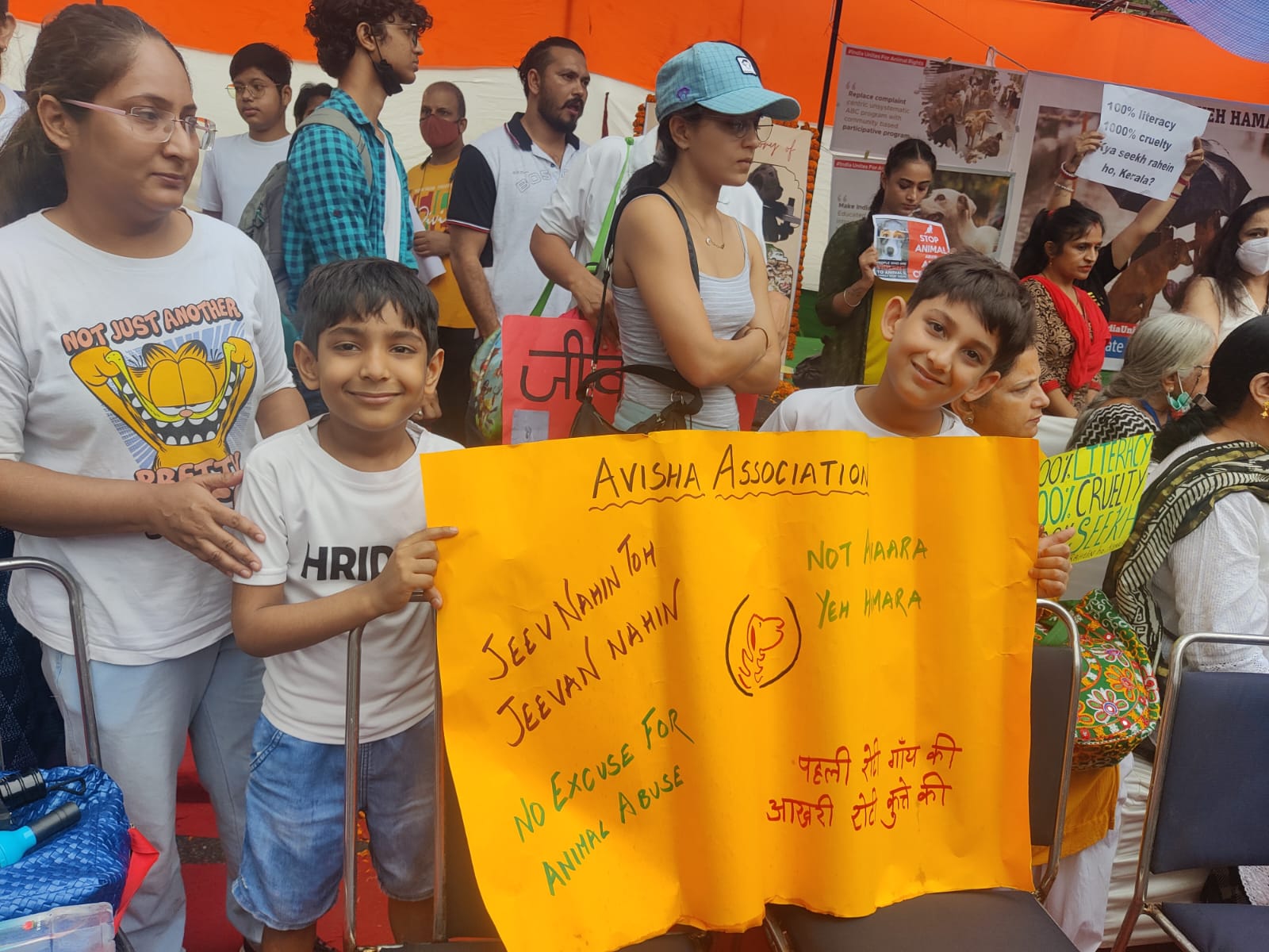 Children hold posters against animal cruelty at the Jantar Mantar in Delhi on Saturday. (HT Photo)